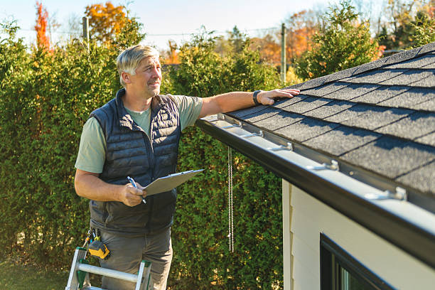 Professional Roofing technician working in Hunter, OK